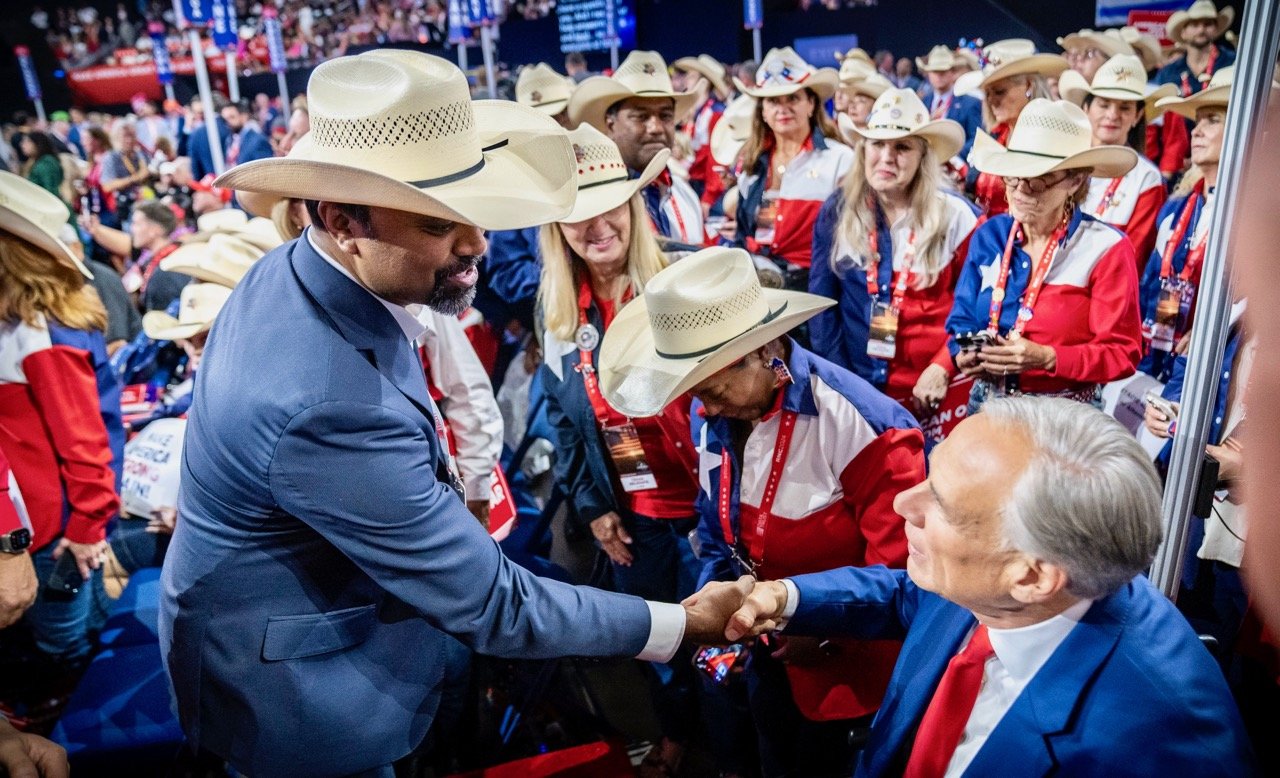 Abraham George with Governor Greg Abbott